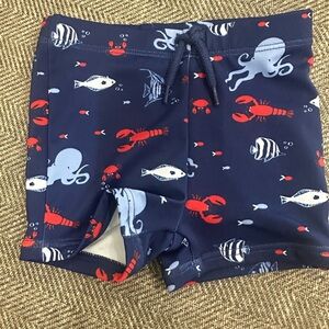 Janie and Jack Navy Swim Shorts with Sea Creature Print 6-12m
